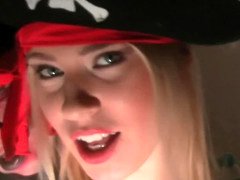 A blonde with a sexy body is giving a blow job in her costume