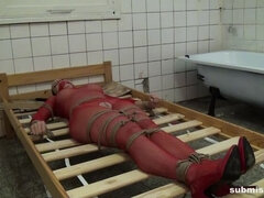 Cindy in the butchery bound to the bed