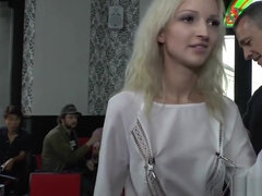 Blonde made to lick mistress in a bar