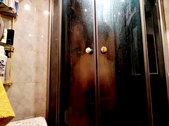 Nude Dominatrix takes a shower. You have the opportunity to spy on your beloved mistress taking a shower