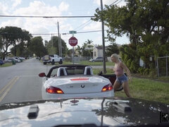 Abella Danger is sucking cock on the driver' seat