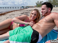 Bailey Brooke orally pleasures Peter Green on the beach
