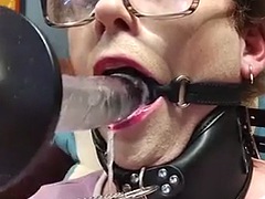 Femboy face fucked by a machine