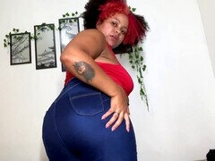 Curvy ebony beauty in blue denim shares her funny moments