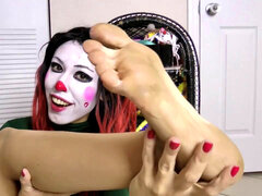 gorgeous Clown lady shows off how Big her soles are