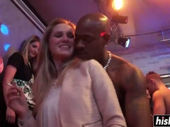 Girls at a party suck on cocks