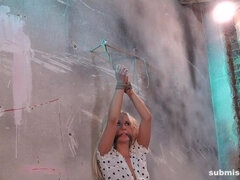 Carla Cox bound up against the wall