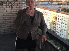 Mature Russian whore shows off butt and twat outdoors