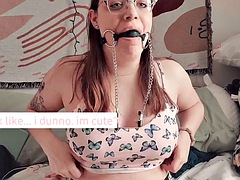 Girl with ball gag and nipple clamps cums so hard her legs are shaking