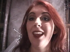 Beautiful girl slaps slave guy's ass and makes him suck her boobs on the floor