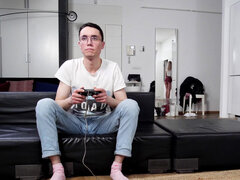 Tall chick Anna Krowe distracts her bf from video games