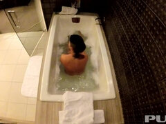 Jezebelle Bond films herself taking a bath
