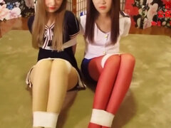 Two Asian schoolgirls 18+ Looking Pretty Secured