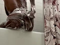 PrinceSleaze takes a shower in a bubble bath