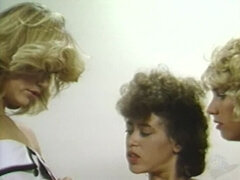 Lesbian Threesome on couch