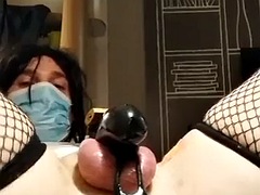 Hot brunette transwoman gets double anal fucked while locked in chastity belt