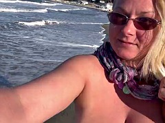 Walking, running and pissingtopless on the public beach
