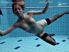 Anetta shows off her sexy naked body underwater