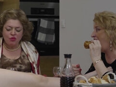 Multiple older women are playing with one lesbian teen