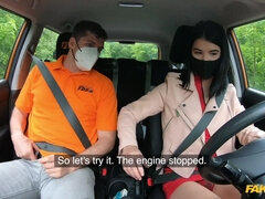 Black-haired cutie screwed by horny driving instructor