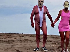 My husband in a chastity cage is exposed on a beach