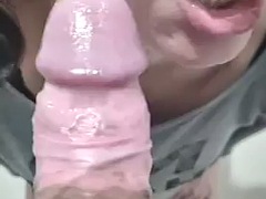 Hotwife sucks cock at a party