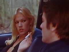 Blonde Brigitte Lahaie sits into the car to ride a dick