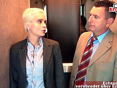 German blonde MILF with big tits and short hair does anal in an elevator