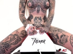Tattooed Amber Luke rides the tremor for the first time