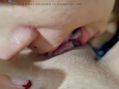 Lesbians have sex in an oral bath