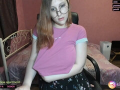 Nerdy girl next door with saggy tits in solo webcam show