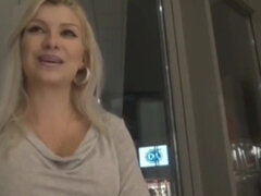 dutch blonde gives head in the mall - public blowjob