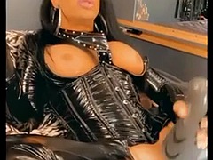 Smoking latex shemale cum