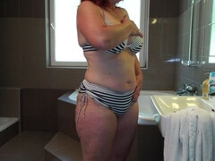 European horny housewife getting wet in the bathtub