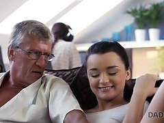 Naughty stepdad fucks stunning brunette on sofa with expert skills