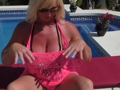 British big breasted Melody Charm having fun at the pool