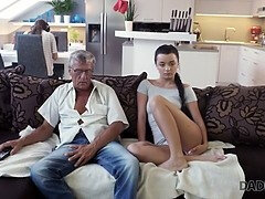 Naughty old man fucks hot young brunette on the sofa