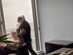 MILF boss fucked at her office window