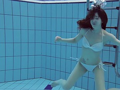 Roxalana Cheh sexy redhead underwater