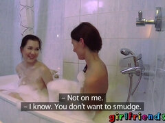 Kira Zen's big tits friend gets a wet pussy fingering in the bath with her girlfriend's help
