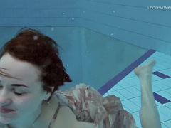 Two hot hairy babes underwater