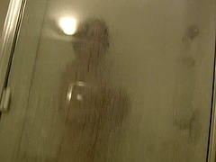 Sexy chick with big boobs filmed in the shower by bf