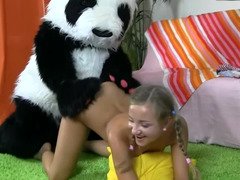 Large panda does its job well cuz the tiny girl is happy