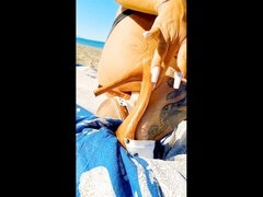 Milf flaunts her ass, feet, and sexy fetish boots on the beach in high high-heeled slippers