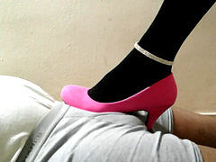 Shoejob teasing in black pantyhose & pinkish high-heeled slippers