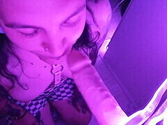 Neon lights, sucking dildo, tattooed girl