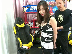 chinese toying game while being tied up