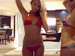 2 blond bimbos in bikinis having some hot lesbian fun in a bath