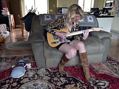 Tiffany playing her guitar badly lmao