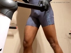 Muscular hairy hunk Reece From Brum walks on the treadmill in a navy singlet showing off his bulging assets